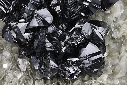Cassiterite with Muscovite. Photo: Joaquim Call�n