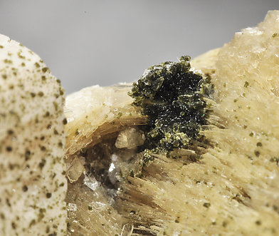 Greifensteinite with Muscovite and Feldspar