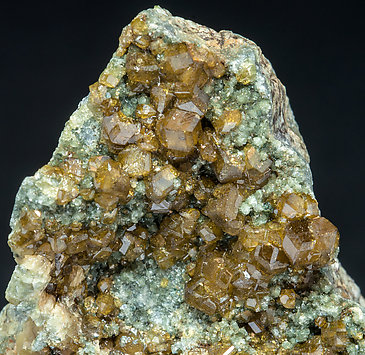 Andradite (variety topazolite) with Clinochlore. 