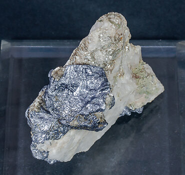 Molybdenite on Quartz and Muscovite