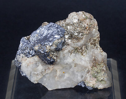 Molybdenite on Quartz and Muscovite