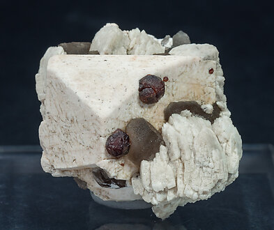 Garnet (Group) with Quartz (varity smoky), Microcline and Albite