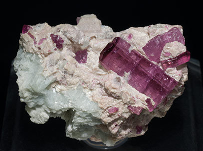 Elbaite (variety rubellite) with Albite. 