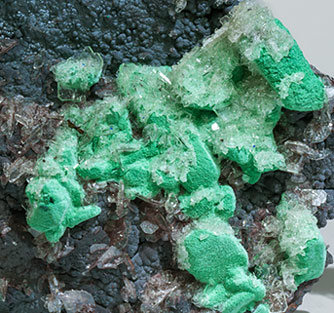 Malachite after Azurite with Baryte and Goethite. 