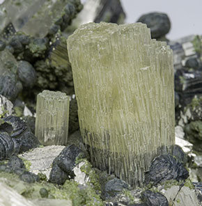 Fluorapatite with Arsenopyrite, Chlorite and Quartz. 