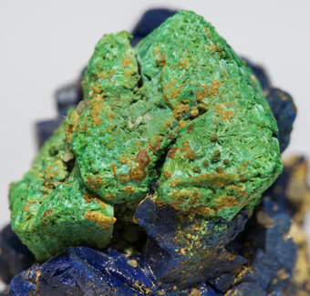 Malachite after Cuprite with Azurite. 