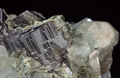 Topaz with Arsenopyrite, Muscovite and Chlorite. 