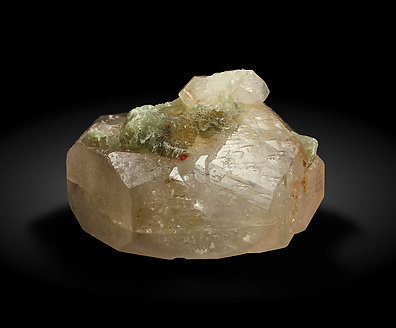 Beryl (variety morganite) with Muscovite. Side