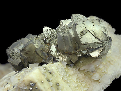 Dolomite with Calcite, Pyrite, Arsenopyrite and Quartz. 