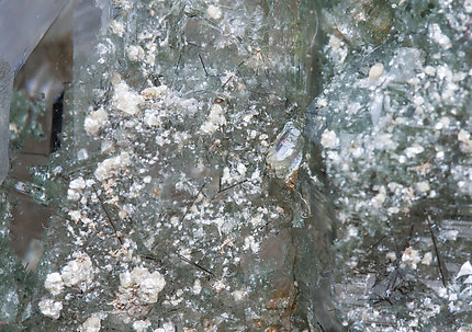 Quartz with Rutile, Chlorite and Mica. 