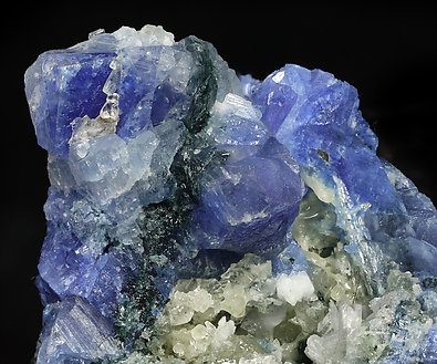 Carletonite with Feldspar, Pectolite, Calcite and Arfvedsonite. 