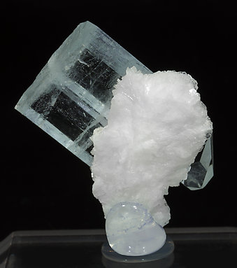 Beryl (variety aquamarine) on Albite. Rear