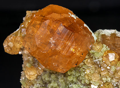 Grossular (variety hessonite) with Diopside. 