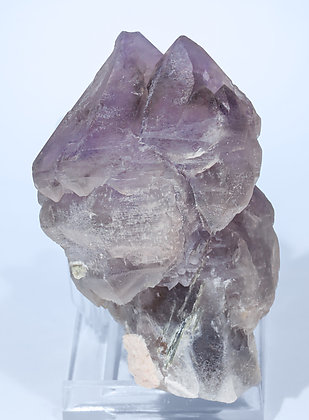 Quartz (variety amethyst) with Quartz (variety smoky) and Microcline. Rear