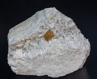 Hydroxylbastn�site-(Ce) and Dolomite. 