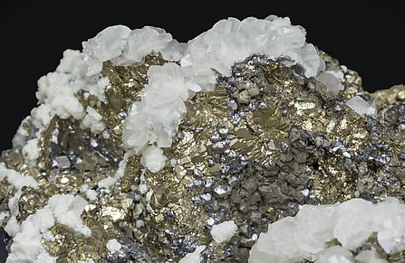 Pyrite after Pyrrhotite with Galena and Calcite. 