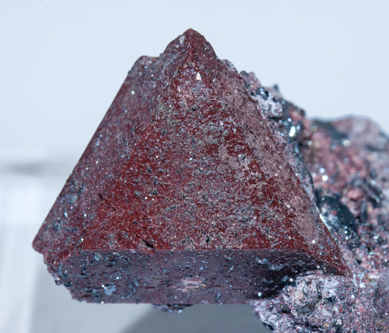 Zunyite with Hematite. 