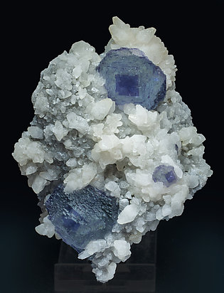 Fluorite with Calcite, Quartz and Pyrite. 