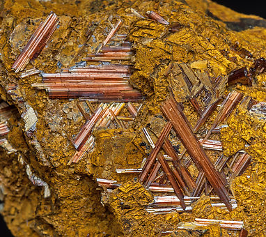 Rutile (variety sagenite) with Siderite and limonite. 