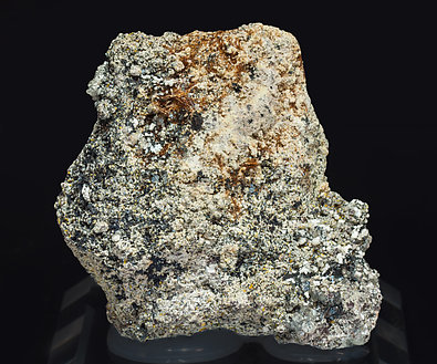 Yuanfuliite with Hematite, Calcite and Diopside. 