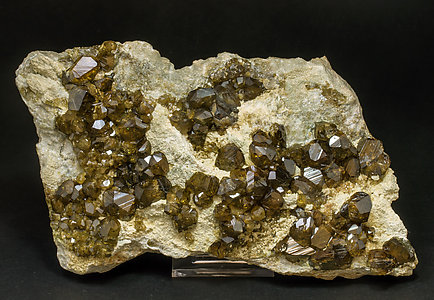 Andradite (variety topazolite) with Calcite. Front