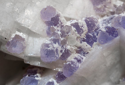 Fluorite with Quartz and Feldspar (variety valencianite). 