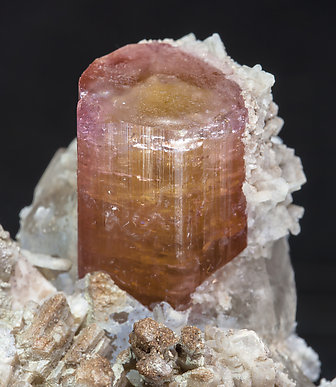 Elbaite-Schorl Series (variety rubellite) with Quartz and Feldspar. 