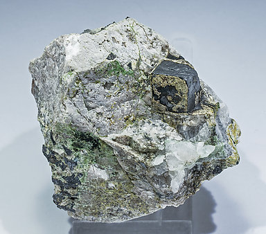 Ullmannite (As-bearing) with Calcite. 