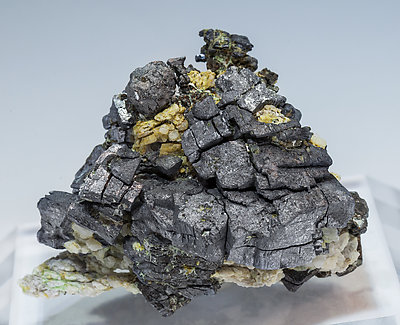 Ullmannite (As-bearing) with Calcite. 