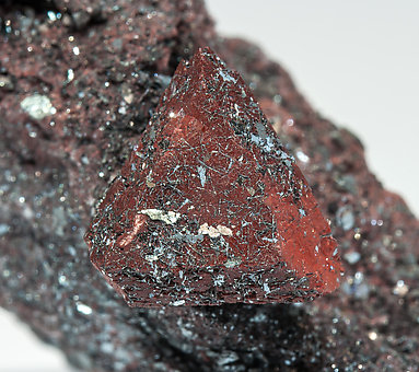 Zunyite with Hematite. 