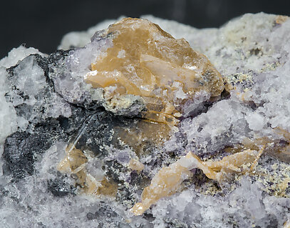 Wulfenite (variety chillagite) with Baryte, Fluorite, Cerussite and Galena. 