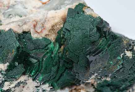 Malachite xx with Dolomite and Quartz. 