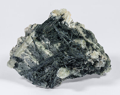 Chlorapatite on Ferro-actinolite with Microcline. Front