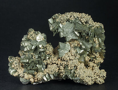 Marcasite with Siderite and Muscovite. 