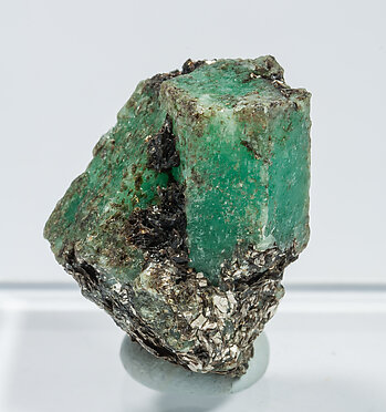 Beryl (variety emerald) with Phlogopite. Front