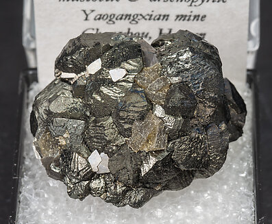 Stannite with Muscovite and Arsenopyrite. 