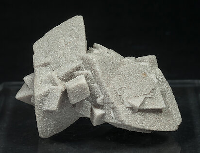 Calcite with sand inclusions. Rear