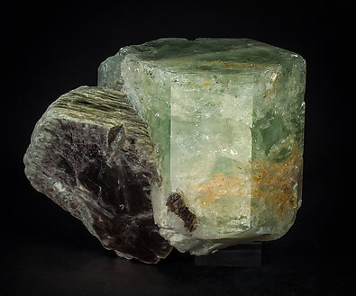 Beryl (variety aquamarine) with Muscovite. Rear