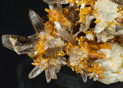 Zircon with Quartz (variety smoky), Orthoclase and Aegirine. 