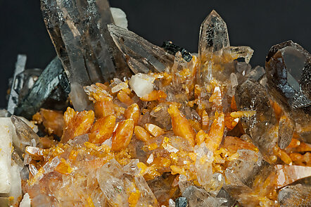 Zircon with Quartz (variety smoky), Orthoclase and Aegirine. 