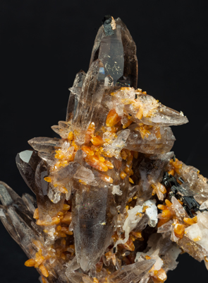 Zircon with Quartz (variety smoky), Orthoclase and Aegirine. 