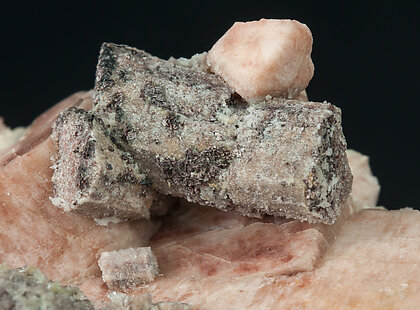 Microcline with Quartz after Vesuvianite. 