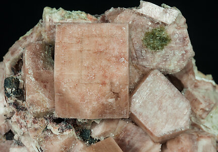 Microcline with Quartz after Vesuvianite. 