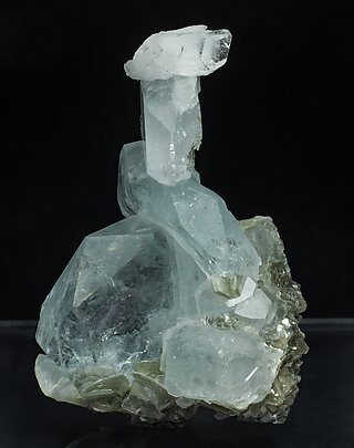 Beryl (variety aquamarine) with Muscovite. 