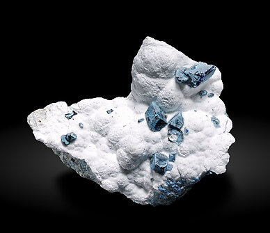 Henmilite coated by Calcite and on Olshanskyite. Photo: Joaquim Calln