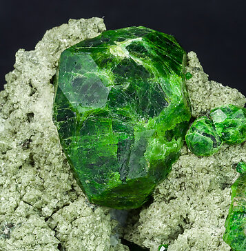 Andradite (variety demantoid) with Diopside. 