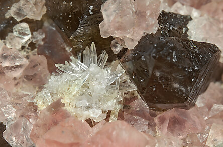 Fluorite (octahedral) with Milarite and Quartz (variety smoky quartz)