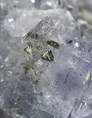 Fluorite with Chalcopyrite inclusions. 