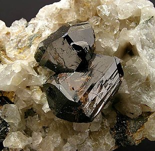 Cassiterite on Quartz. 