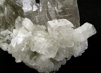 Ba-rich Microcline (variety hyalophane) on Quartz (variety smoky). 